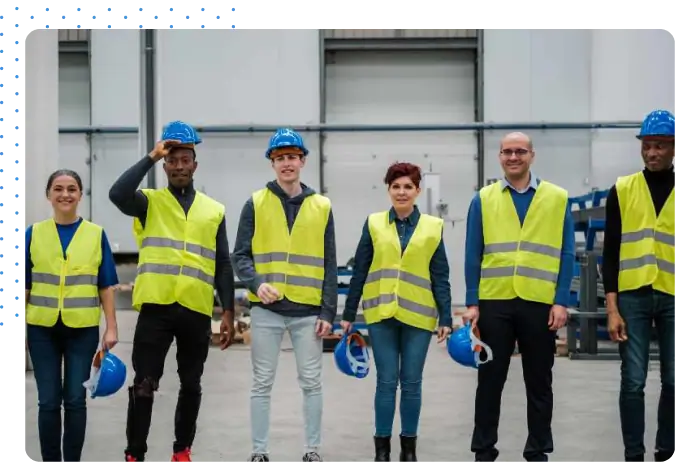 Construction Crew standing and smiling