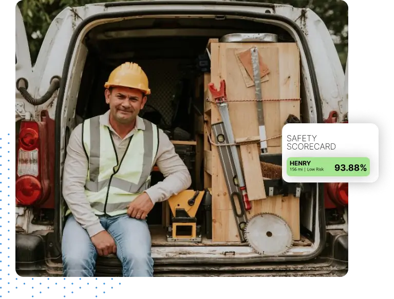 Driver sitting in vehicle with a safety scorecard popup